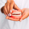 Rena Zeynalova,  DD.  - RZ Qualident Denture Clinic and Laboratory